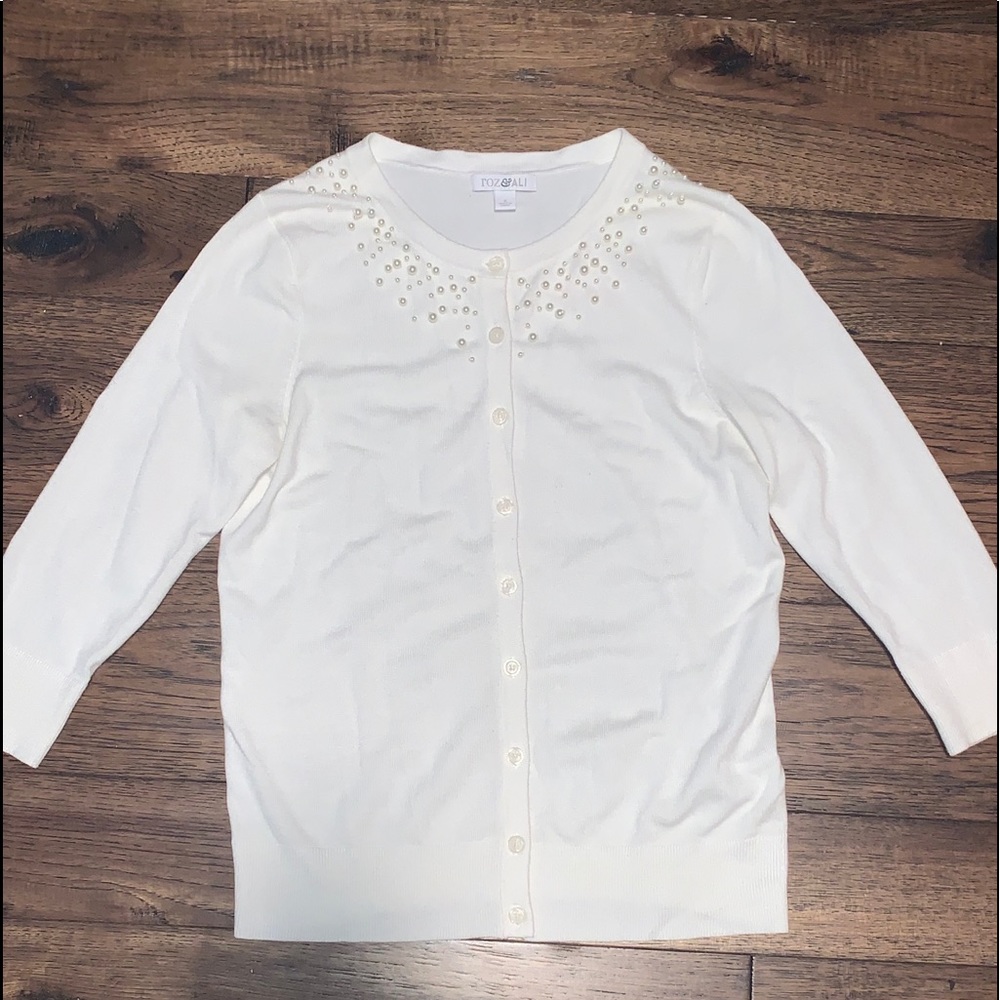 White cardigan with pearl neckline